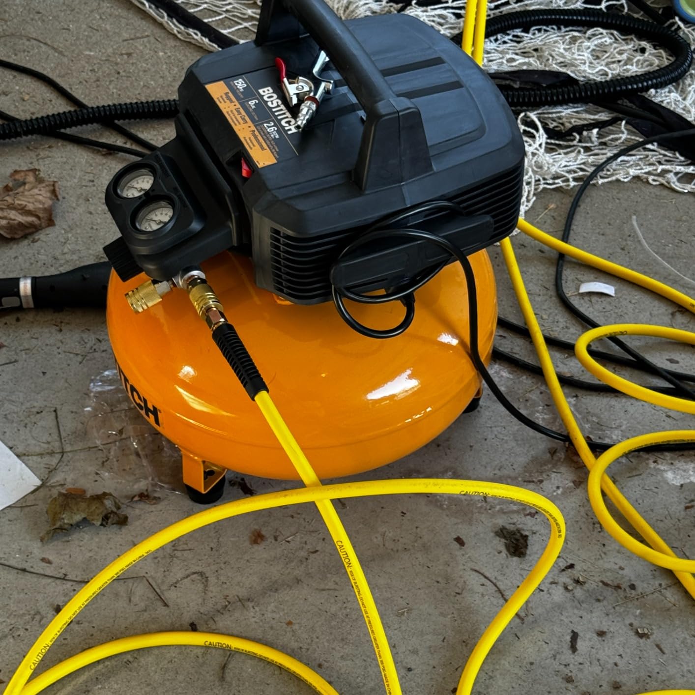 Bostitch 6 Gallon Pancake Air Compressor & 13 Piece Accessory Kit: Air Hose, Blow Gun and Adapter, Blow Chuck, Tire Gauge, Rubber Blow Gun Nozzle, Inflation Needle, and Male Quick Connect Plug customer photo 1