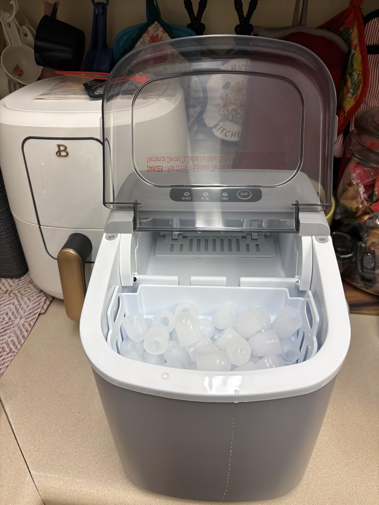 Portable Countertop Ice Maker Machine with Handle, 9 Bullet-Shaped Ice Cubes Ready in 6 Mins, 26Lbs/24H, Self-Cleaning Function with Ice Scoop and Basket for Home/Kitchen/Party (Grey) customer photo 1