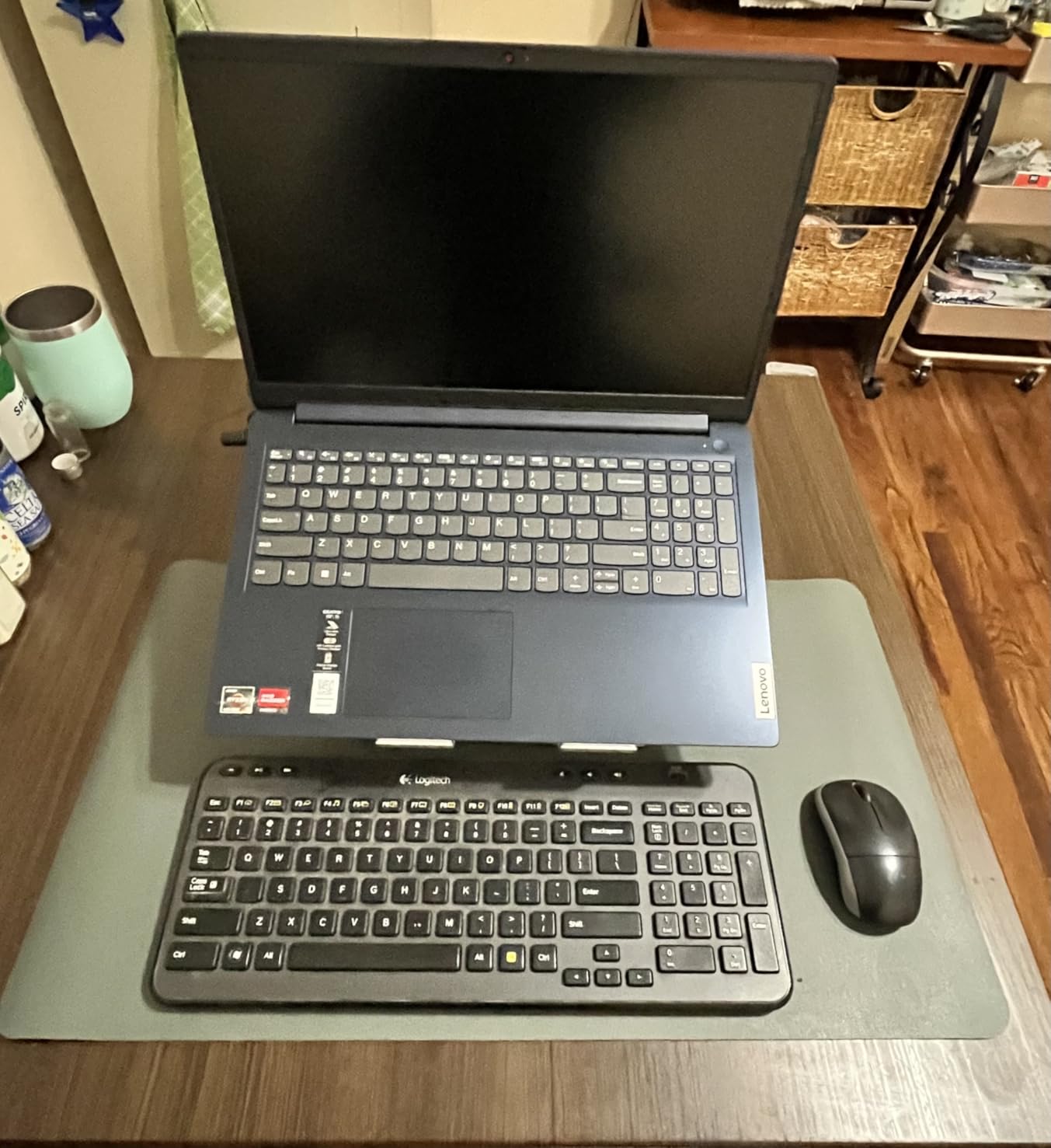 Amazon Basics Sturdy and Portable Ergonomic Laptop Stand for Desk, Height Adjustable Riser with Ventilated Cooling, Foldable, Fits all Laptops up to 17.3 Inch, Silver, 10 x 8.7 x 6 in customer photo 1