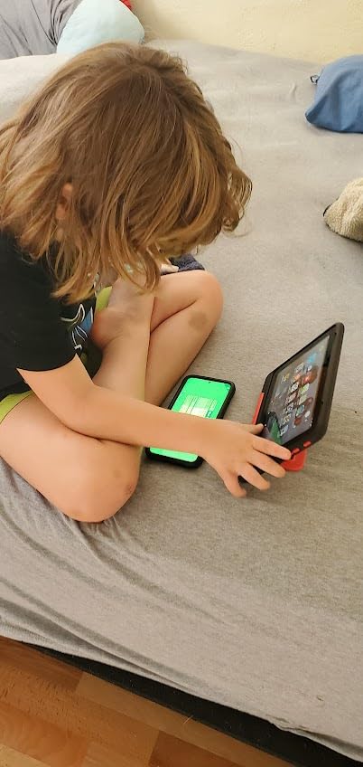 Fire HD 8 Kids Pro tablet (newest model), ages 6-12. Bright 8 HD screen, includes ad-free content, parental controls, 13-hr battery, slim case for older kids, 32GB, Jungle Cat customer photo 2