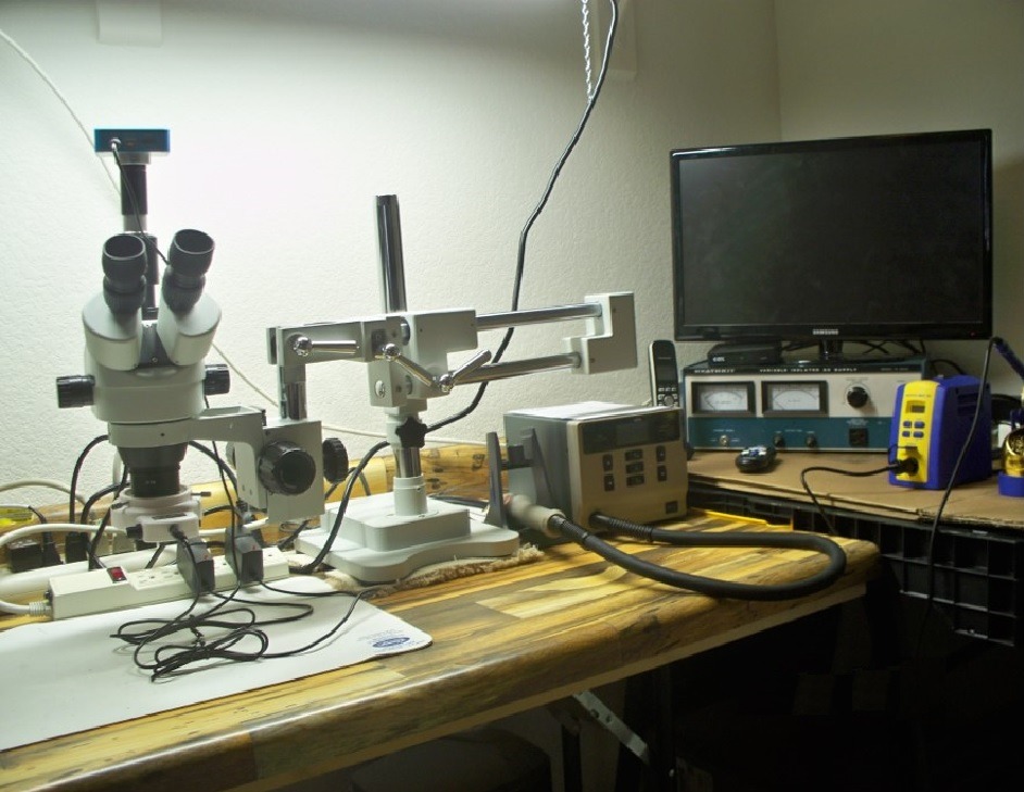 AmScope SM-4TPZ Professional Trinocular Stereo Zoom Microscope with Simultaneous Focus Control, WH10x Eyepieces, 3.5X-90X Magnification, 0.7X-4.5X Zoom Objective, Ambient Lighting, Double-Arm Boom Stand, Includes 0.5X and 2.0X Barlow Lens customer photo 1