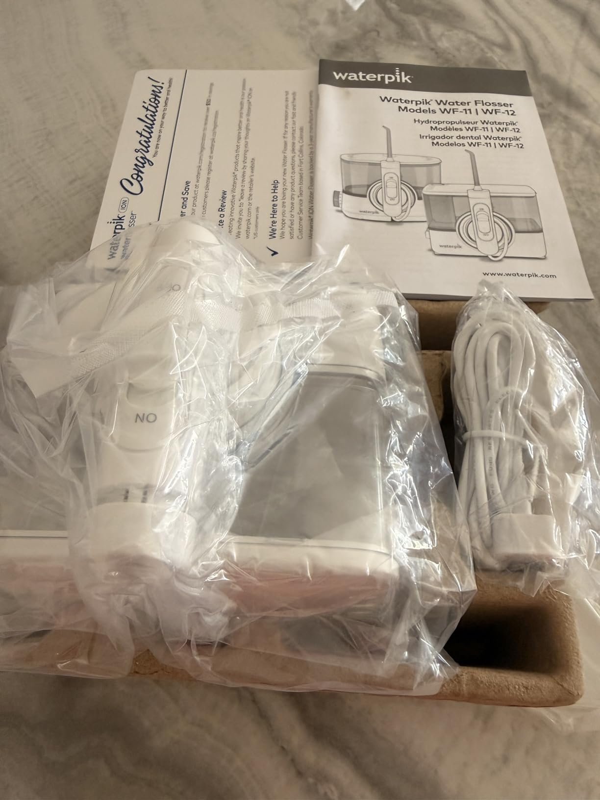 Waterpik ION Professional Water Flosser, Rechargeable and Portable for Teeth, Gums, Braces, 10 Settings, 7 Flossing Tips For Multiple Users And Needs, ADA Accepted, WF-12 White, Packaging May Vary customer photo 1