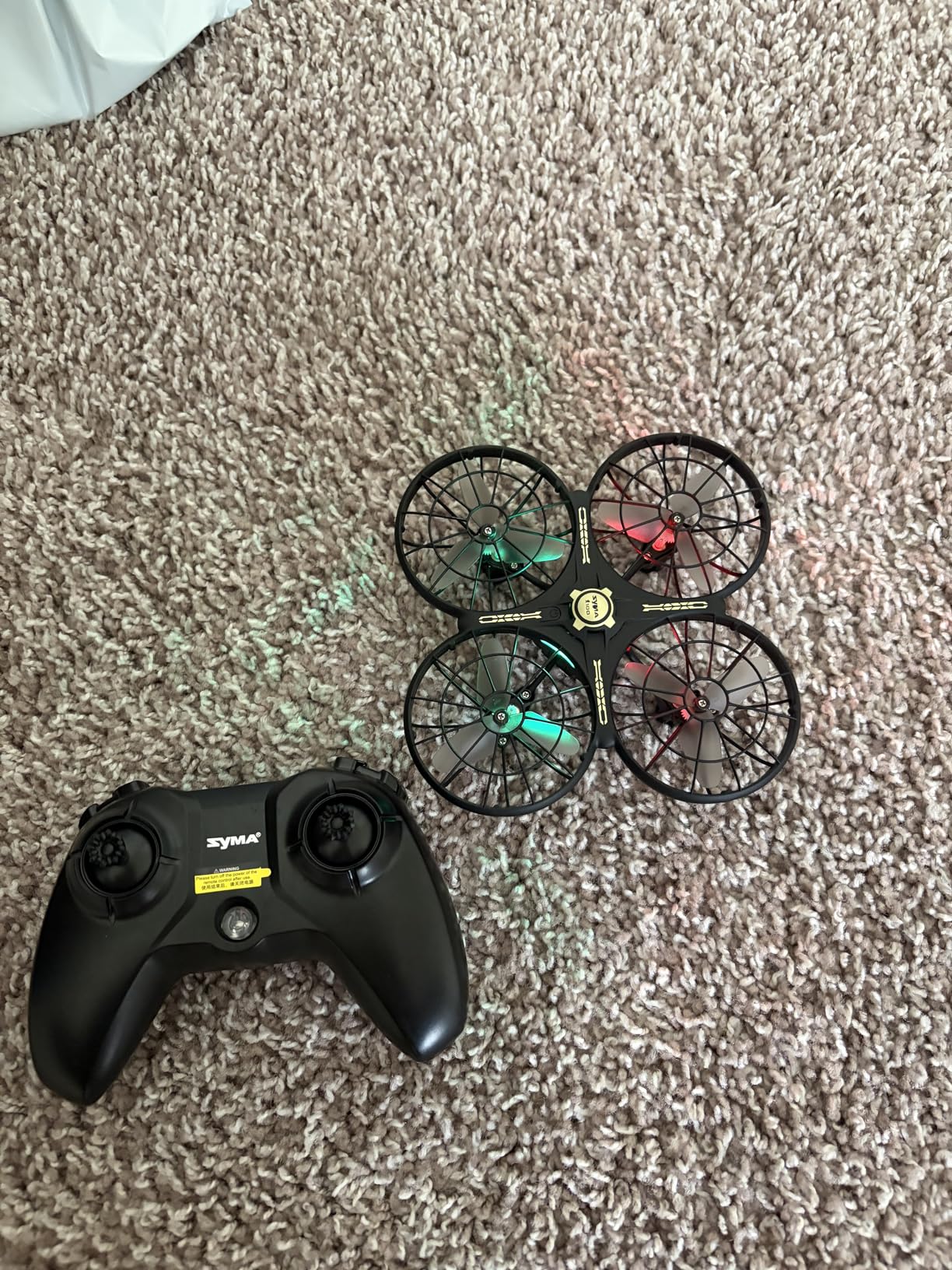 SYMA X100 Drone for Kids 8-12, Automatic Obstacle Avoidance, Up to 20 Mins Flight Time(2 Batteries), One-Key 360 Flips and Altitude Hold, Full-Guard Safe Indoor Drone Gift for Boys & Girls customer photo 1