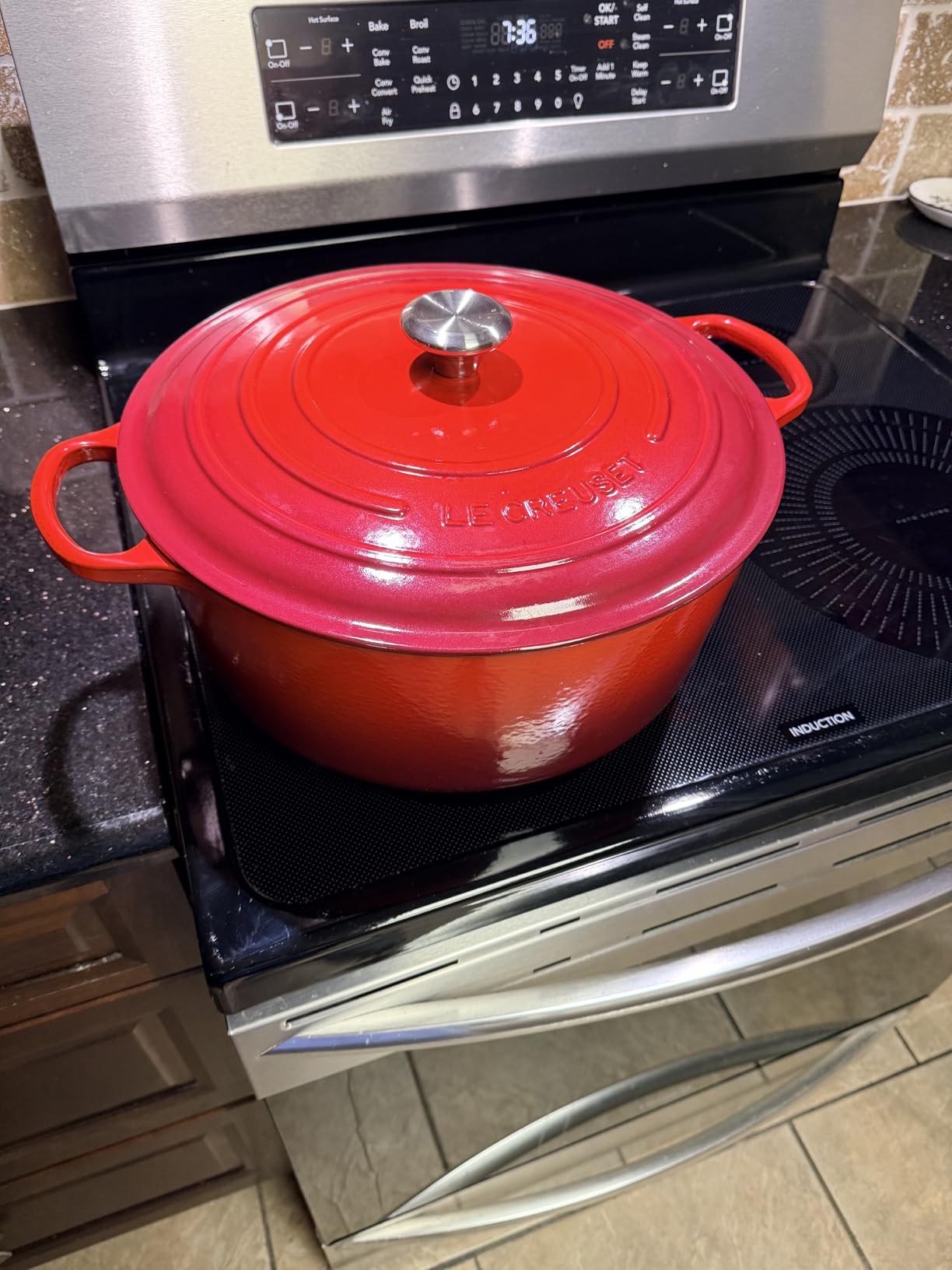 Le Creuset Enameled Cast Iron Signature Round Dutch Oven, 5.5 qt., Cerise customer photo 1