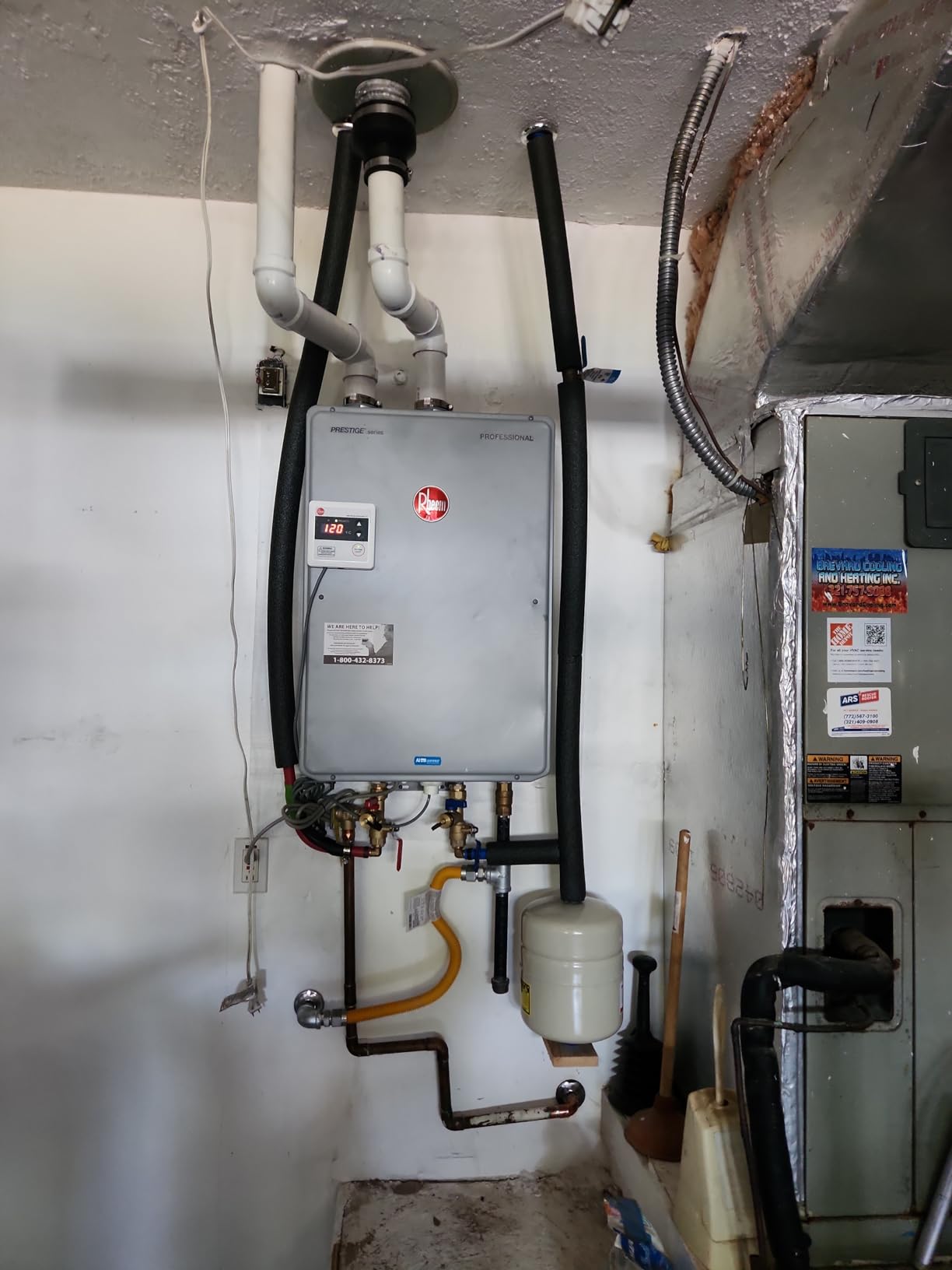 Rheem Prestige High Efficiency Condensing Tankless Indoor Natural Gas Water Heater, RTGH-84DVLN-2 8.4 GPM customer photo 1