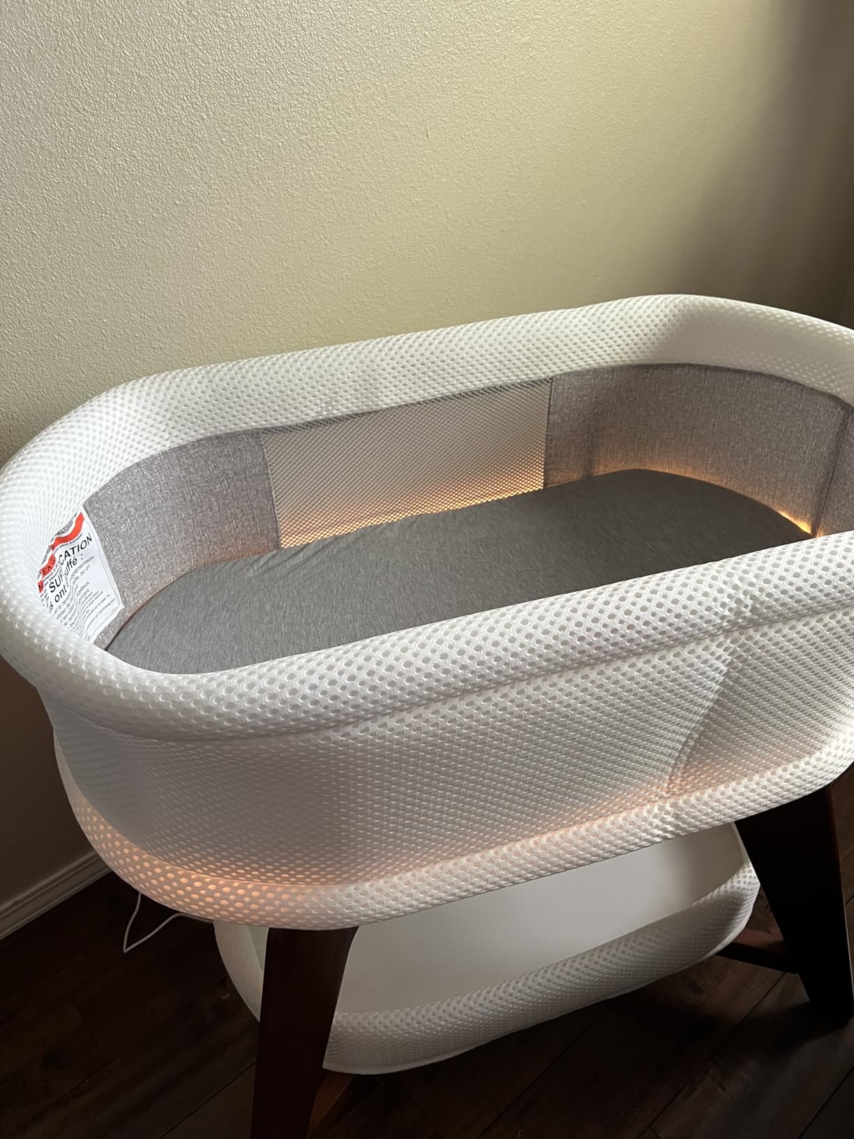 TruBliss Evi Smart Baby Bassinet Beside Sleeper with Auto-Glide, Ambient Nightlight & Sensory Sounds, Compatible with Alexa and Google Home, Includes 2 Sheets (Soft White w/Espresso Legs) customer photo 2