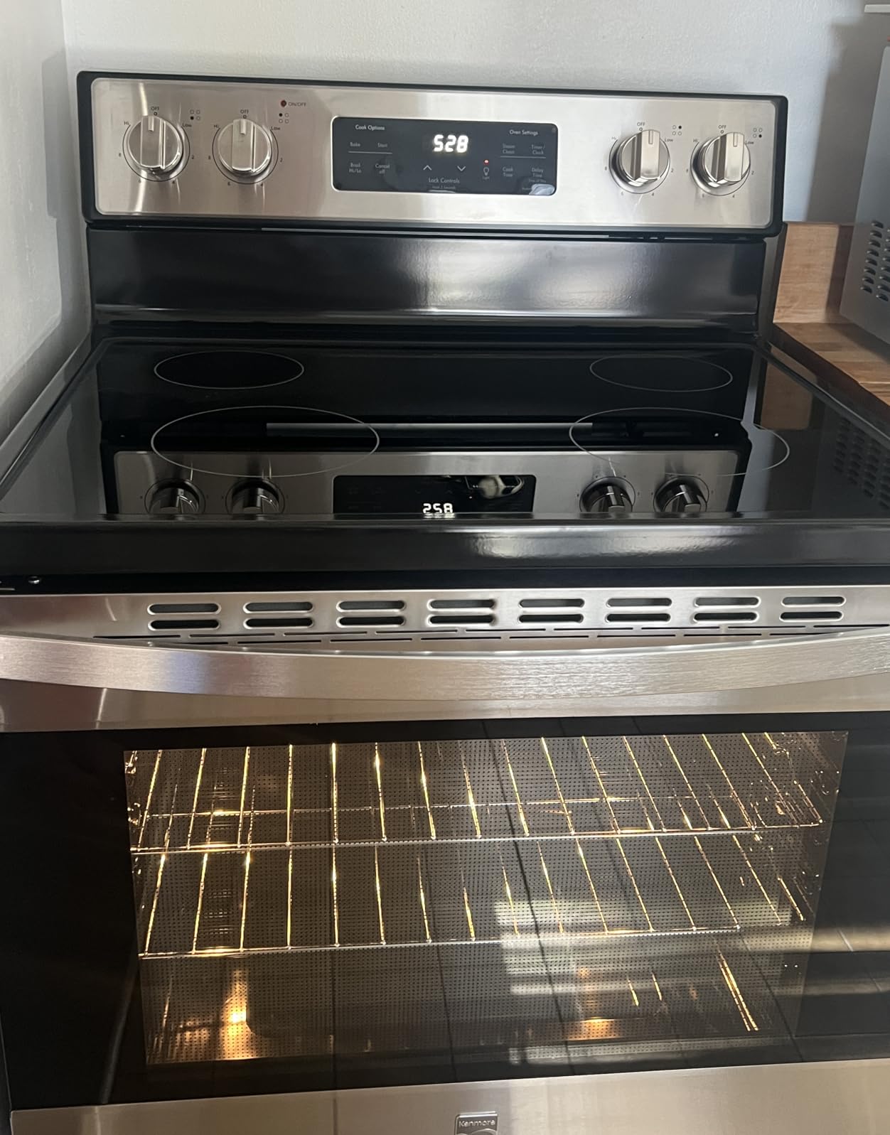 Kenmore 5.2 cu ft. Rear Control Electric Range - 4 Cooktop Elements - Steam Clean Oven & Hidden Bake for Easy Cleaning - Ultra-Durable Chrome Racks & Storage Drawer - Black customer photo 1