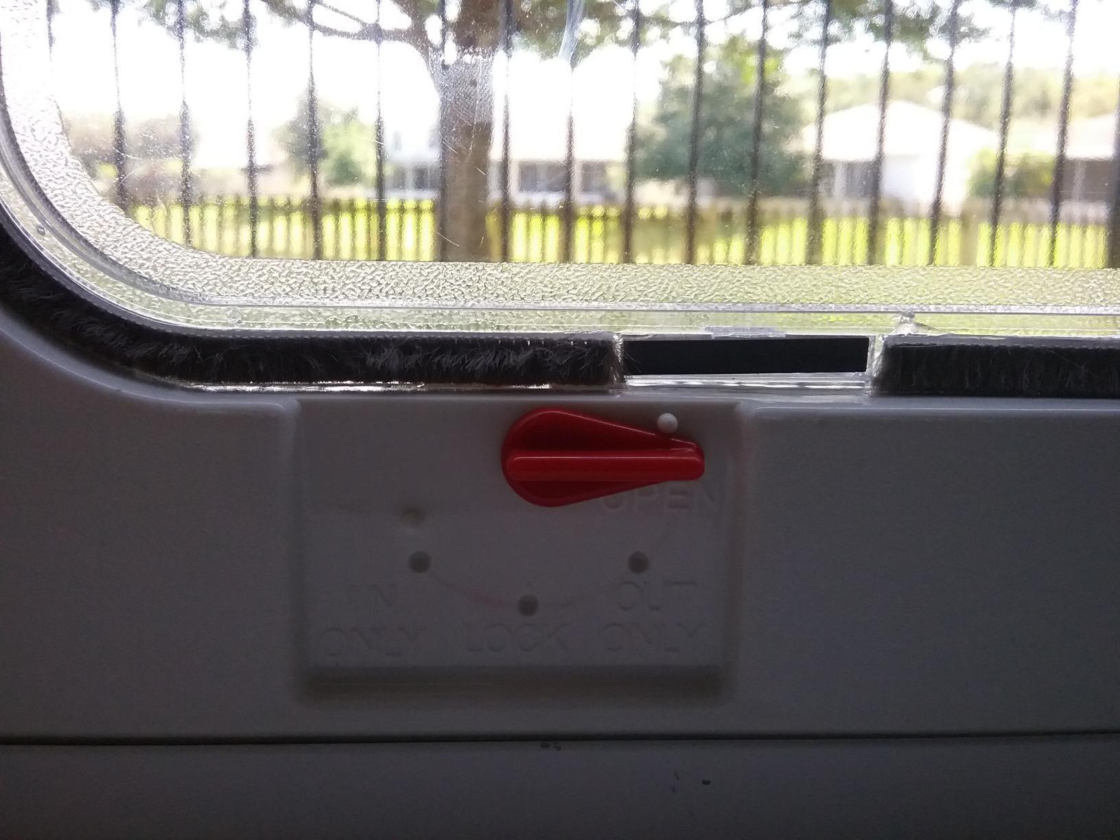 Ideal Pet Products Aluminum Sash Window Pet Door, Adjustable to Fit Window Widths from 33