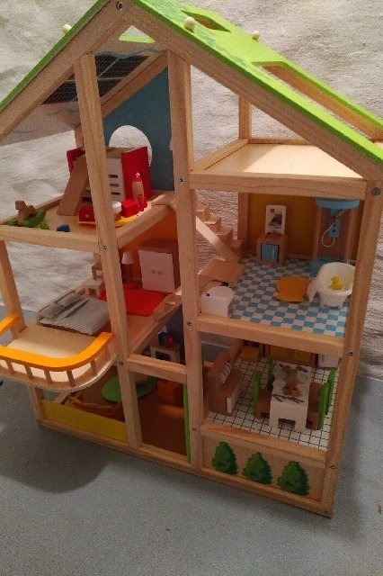 All Seasons Kids Wooden Dollhouse by Hape | Award Winning 3 Story Dolls House Toy with Furniture, Accessories, Movable Stairs and Reversible Season Theme L: 23.6, W: 11.8, H: 28.9 inch customer photo 1