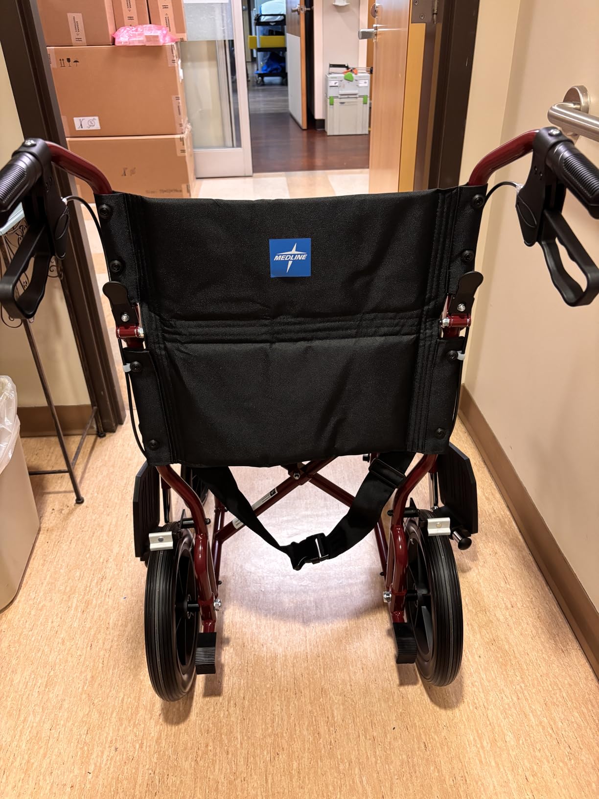 Medline Lightweight Foldable Transport Wheelchair with Handbrakes and 12-Inch Wheels, Red Frame, Black Upholstery customer photo 2