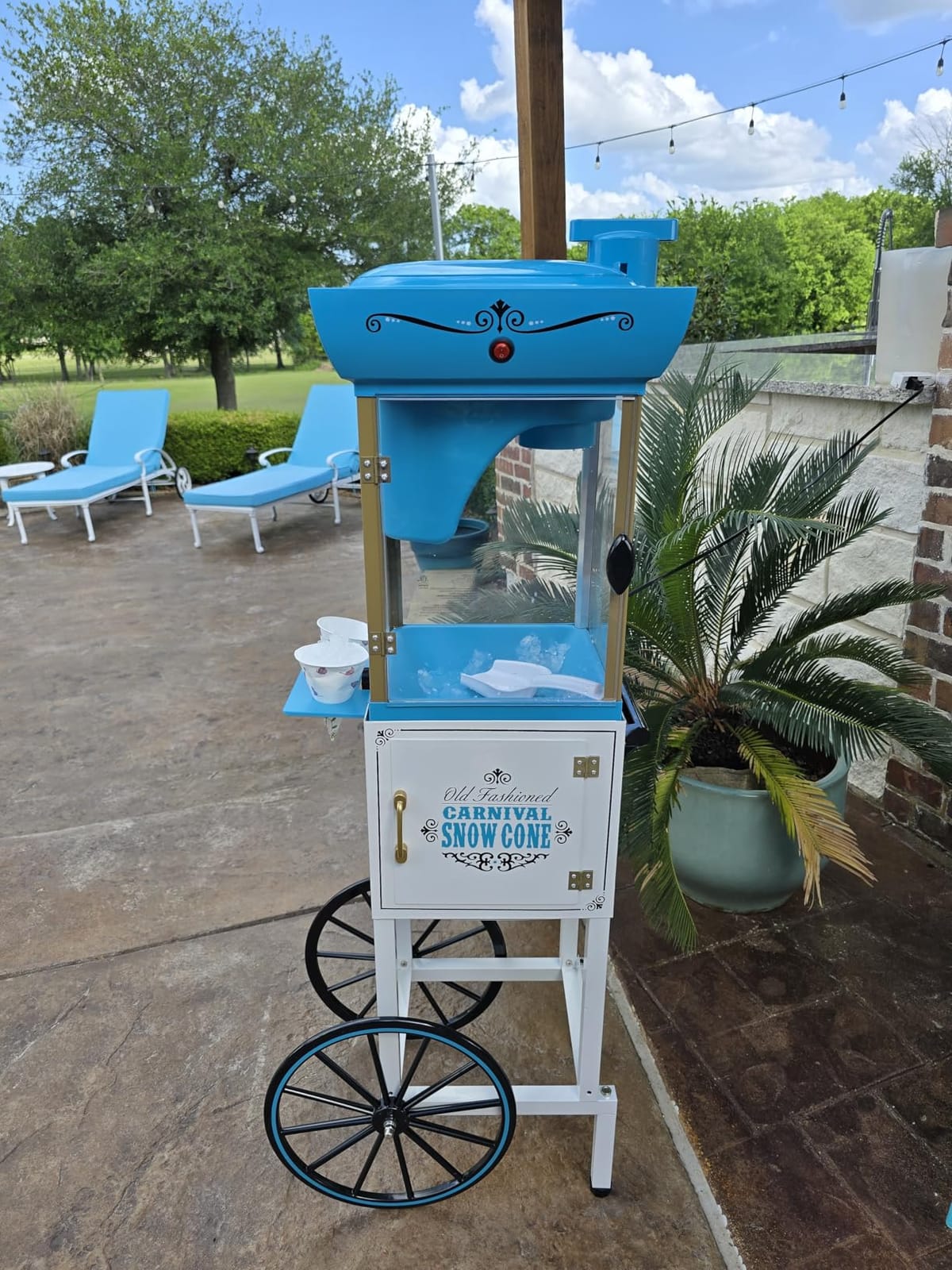 Nostalgia Snow Cone Shaved Ice Machine - Retro Cart Slushie Machine Makes 48 Icy Treats - Includes Metal Scoop, Storage Compartment, Wheels for Easy Mobility - White, Blue customer photo 2