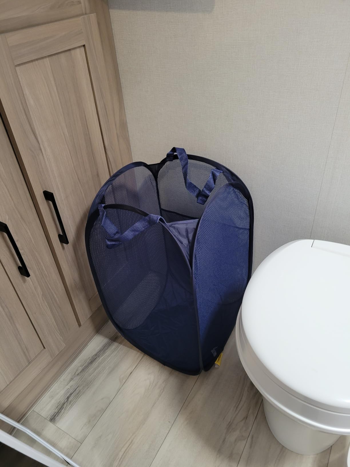Handy Laundry Collapsible Mesh Pop-Up Hamper with Side Pocket | Breathable mesh keeps clothes fresh; sturdy foldable build saves space. Wide opening makes loading easy. Available in black. customer photo 1