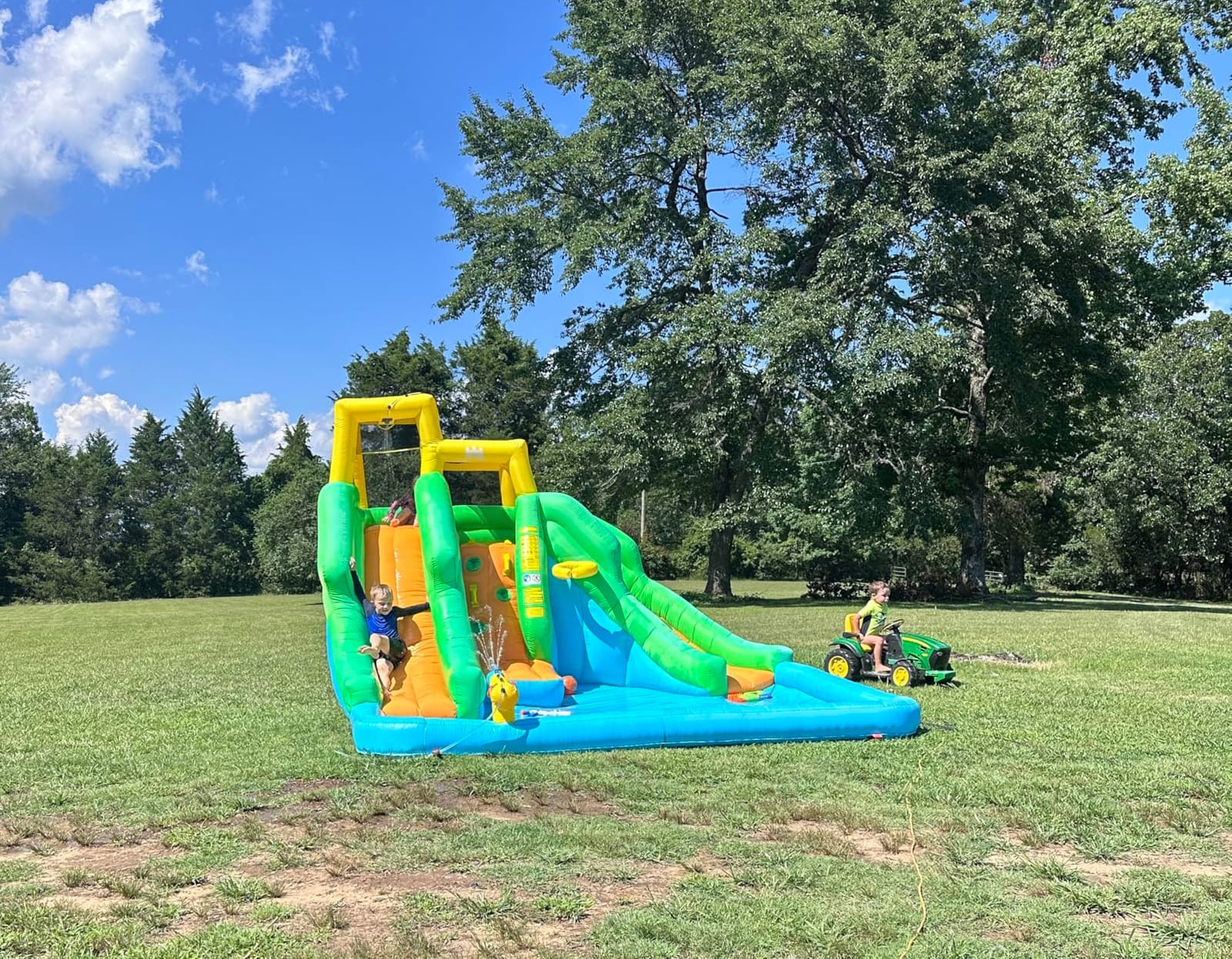 BOUNTECH Inflatable Water Slide, Dual Slides Giant Water Park Jump Castle 6 in 1 with Blower for Outdoor Racing Fun, Climbing Wall, Blow up Water Slides Inflatables for Big Kids 3-10 Outdoor Indoor customer photo 1