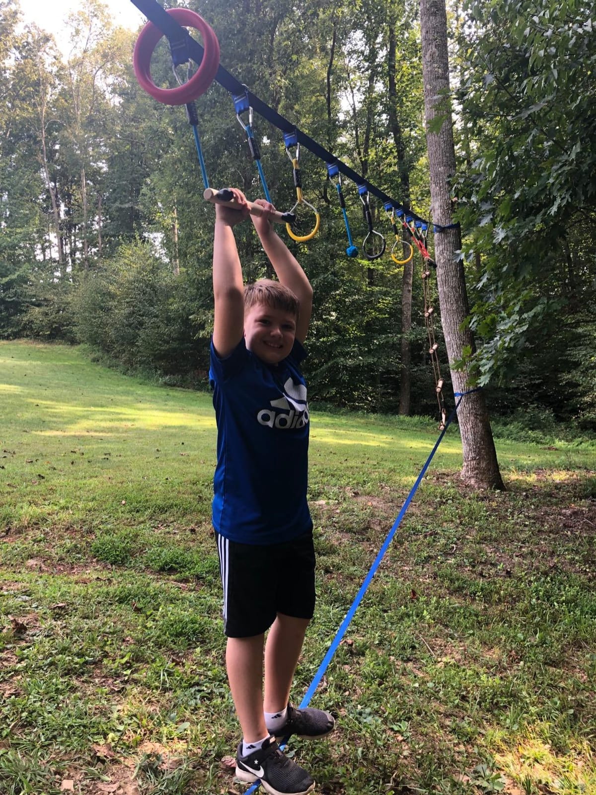 Ninja Warrior Obstacle Course for Kids, 2x56ft Slackline Kit with 8 Ninja Accessories+Fast-Setup Buckles - Monkey Bar, Rope Ladder, Gymnastic Ring, Arm Trainer and Monkey Fist, Supports 880 lbs customer photo 1