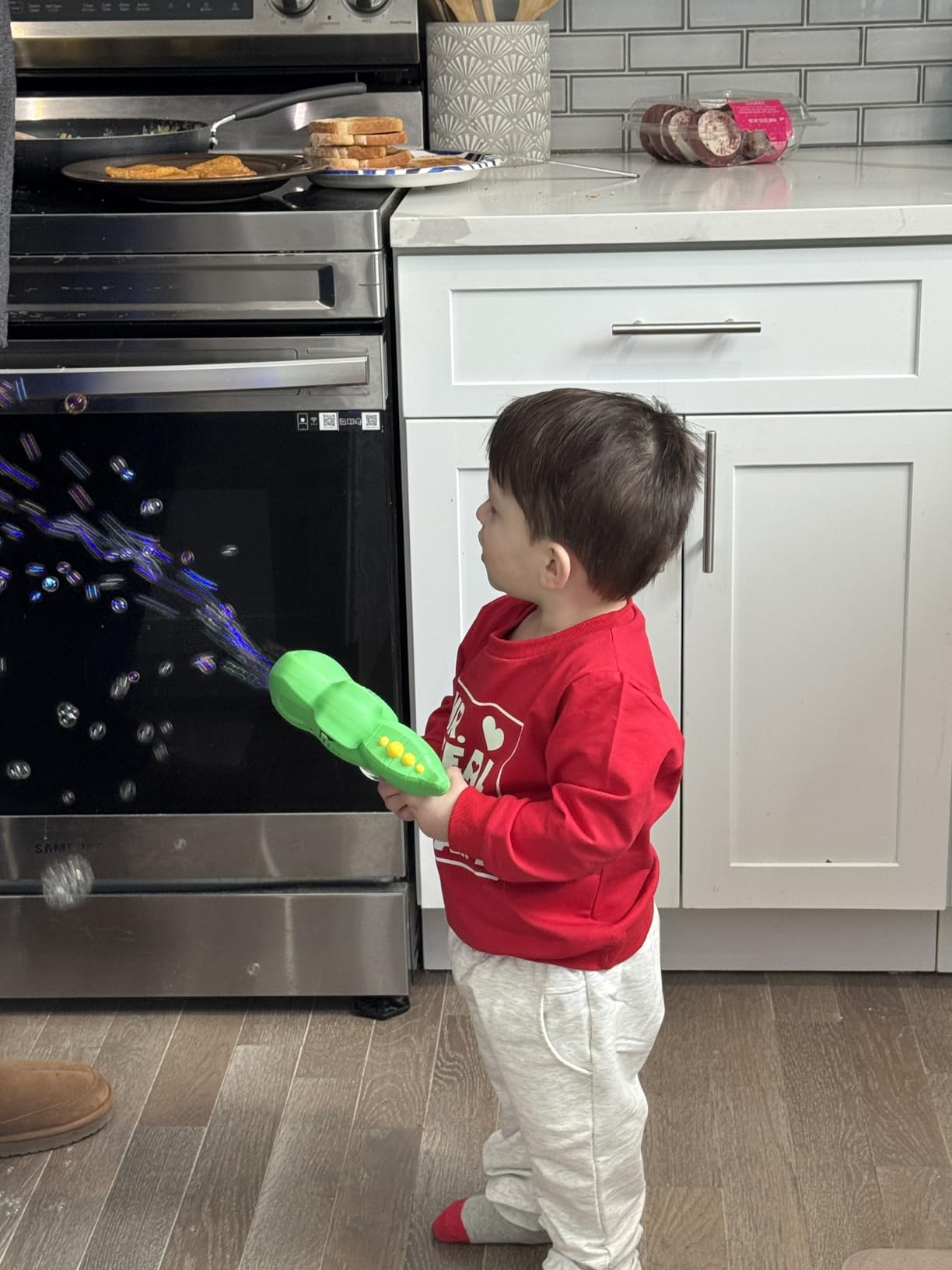 JOYIN 2 Kids Bubble Gun with 2 Bottles Refill Solution, Bubble Machine Gun for Toddlers Kids 4-8, Party Favors, Summer Toy, Outdoors, Easter, Birthday Gift customer photo 1