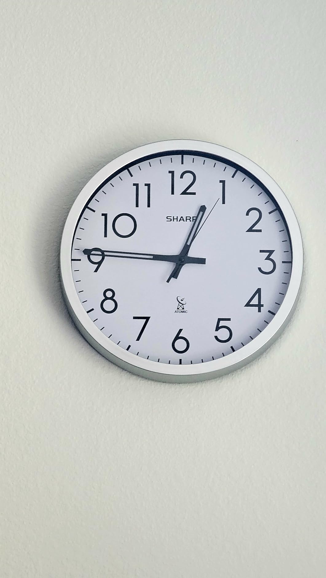 Sharp 12-Inch Atomic Wall Clock, Battery Operated, Silver Brushed Finish, Self-setting atomic time, Easy-read analog face, Automatic time adjustment, Simple setup, Battery operated, Home or office customer photo 2