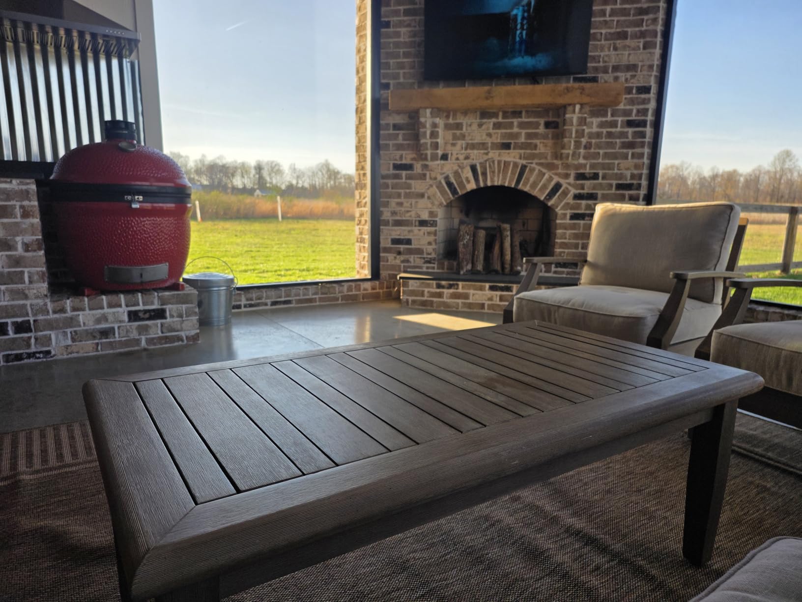 Signature Design by Ashley Wood Outdoor Coffee Table, Grayish Brown, Weather resistant eucalyptus wood, 5-step protective coating, Slatted top sheds rainwater customer photo 2