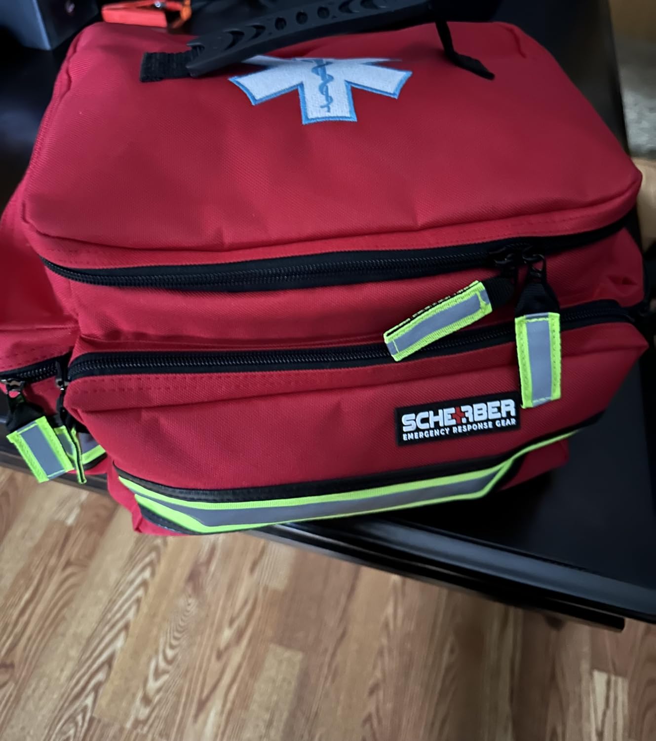 Scherber First Responder Fully-Stocked Professional Essentials EMT/EMS Trauma Kit | HSA/FSA Approved | Reflective Bag w/8 Zippered Pockets & Compartments & 200+ First Aid Supplies - Red customer photo 1
