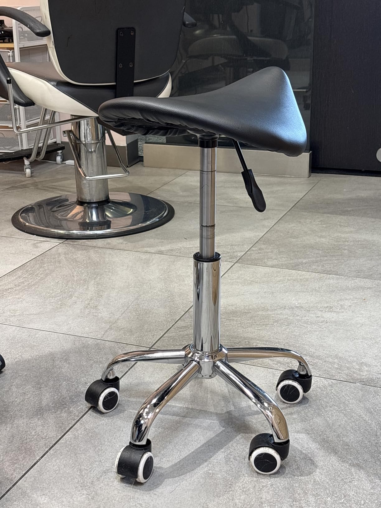 KKTONER Rolling Saddle Stool PU Leather Swivel Adjustable Rolling Stool with Wheels Salon Chair (Pink) customer photo 2