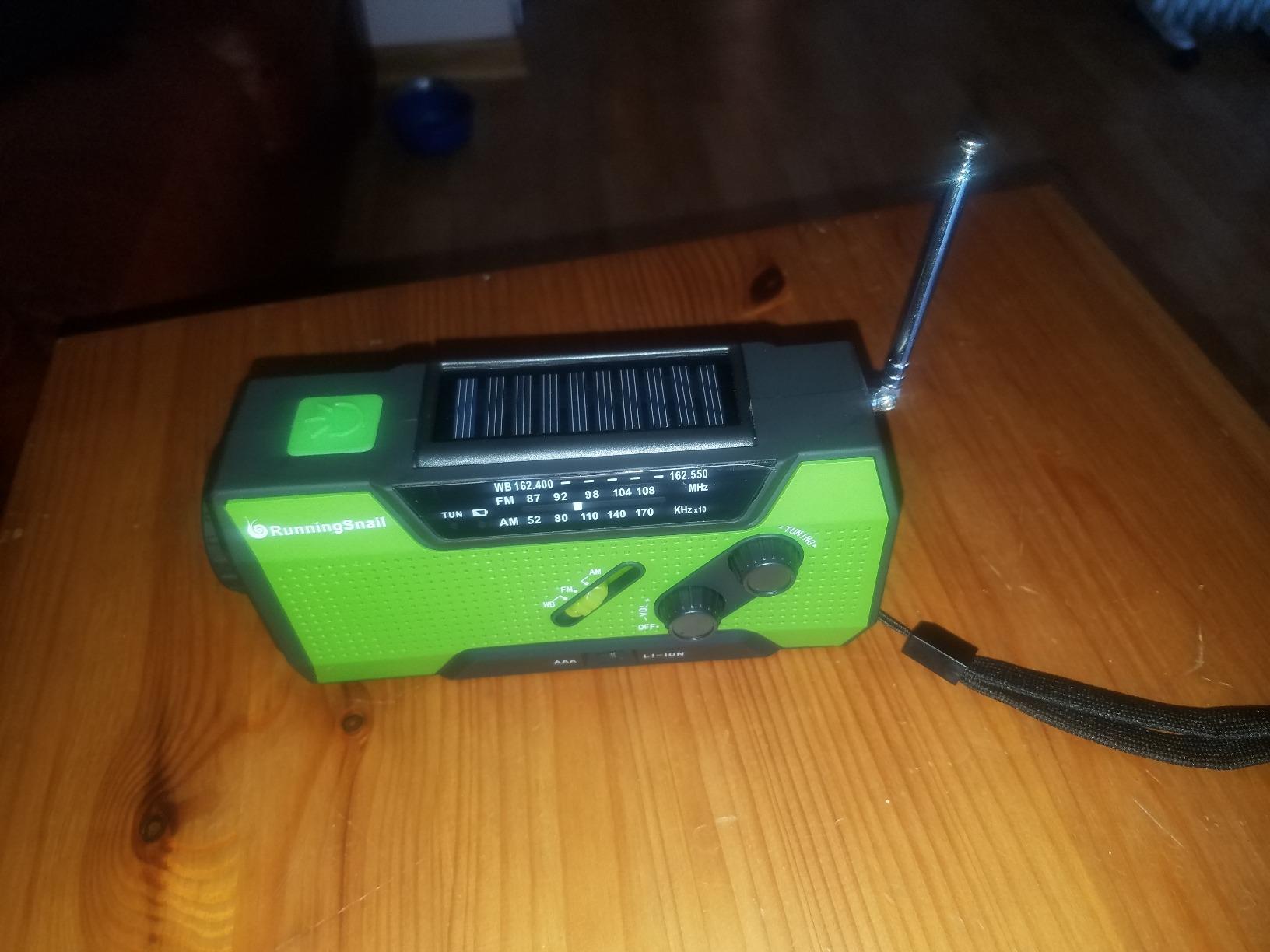 RunningSnail Hand Crank Emergency Radio with 3 Built-in Cable for Hurricane | AM/FM/NOAA Weather Radio with 7400mWh Battery, Hand Crank Solar Radio with Flashlight & SOS Siren for Outdoor & Emergency customer photo 1