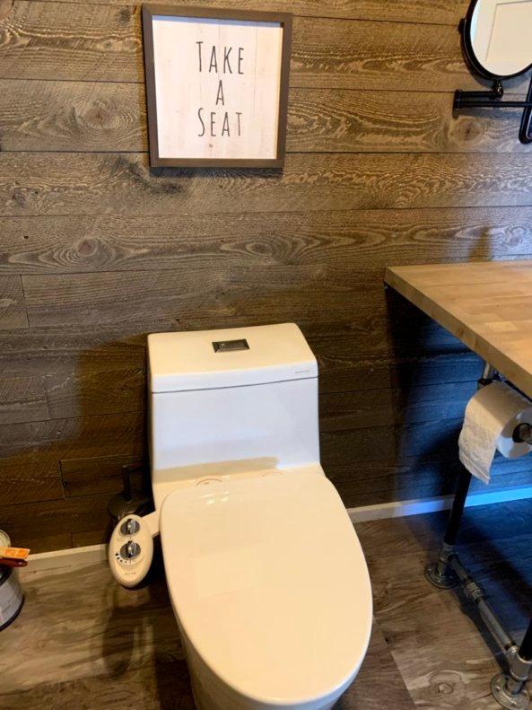 WOODBRIDGEE One Piece Toilet with Soft Closing Seat, Chair Height, 1.28 GPF Dual, Water Sensed, 1000 Gram MaP Flushing Score Toilet with Chrome Button, White, B0940-F-C customer photo 1