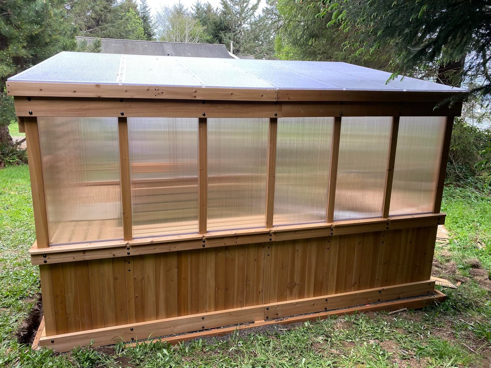 Backyard Discovery Willow 9' x 6' White Cedar Wood and Polycarbonate Walk-in Greenhouse Kit with Exhaust Fan, Windows, Hose Hook-Ups, PowerPort, Staging Shelves for Year-Round Outdoor Gardening customer photo 1