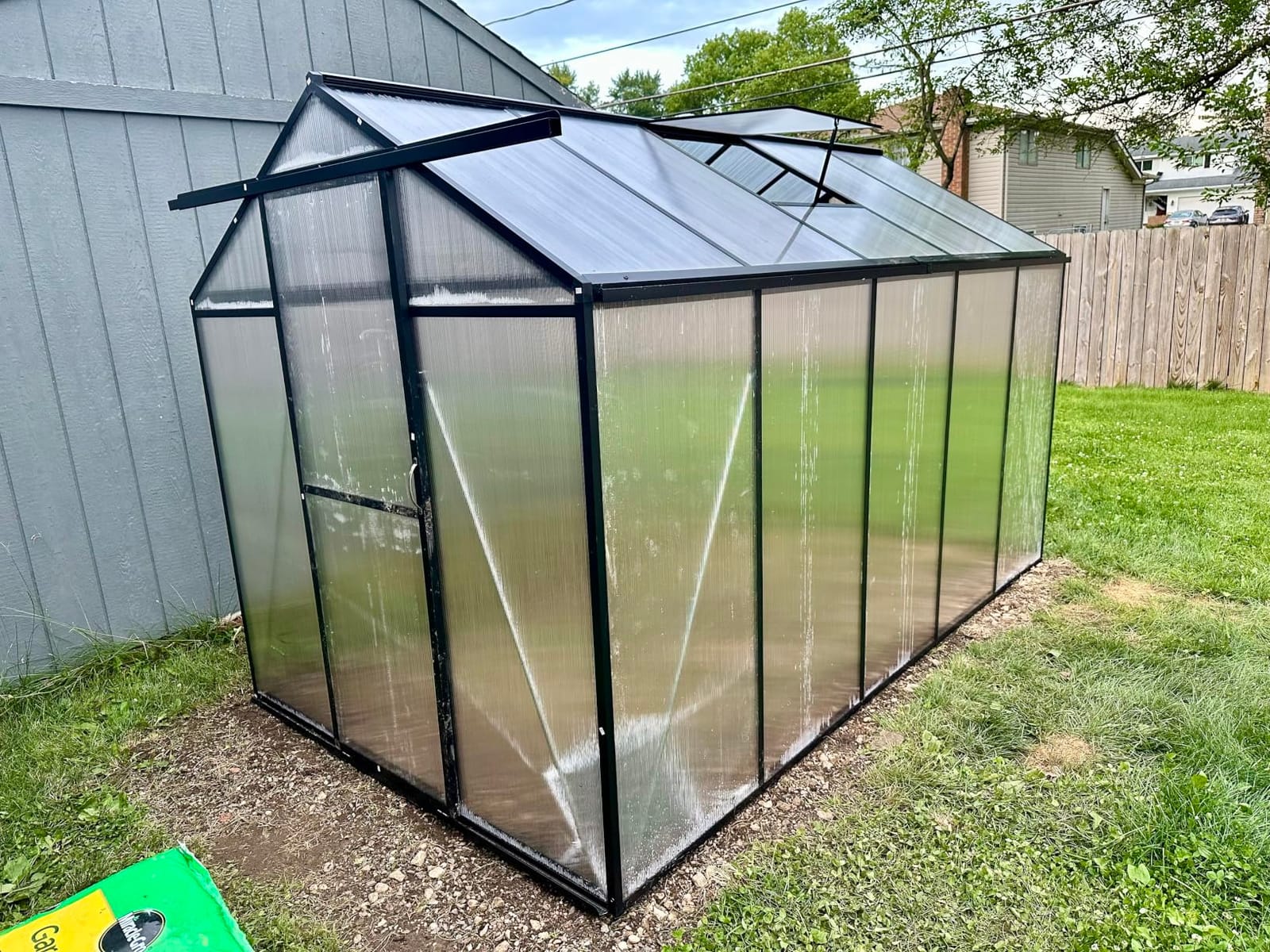 6x10 FT Greenhouse, Easy Assembly Aluminum Polycarbonate Greenhouses for Outdoors with Roof Vent, Large Aluminum Walk-in Greenhouse for Sunroom Patio, Backyard, Garden, Sliding Lockable Door, Black customer photo 2