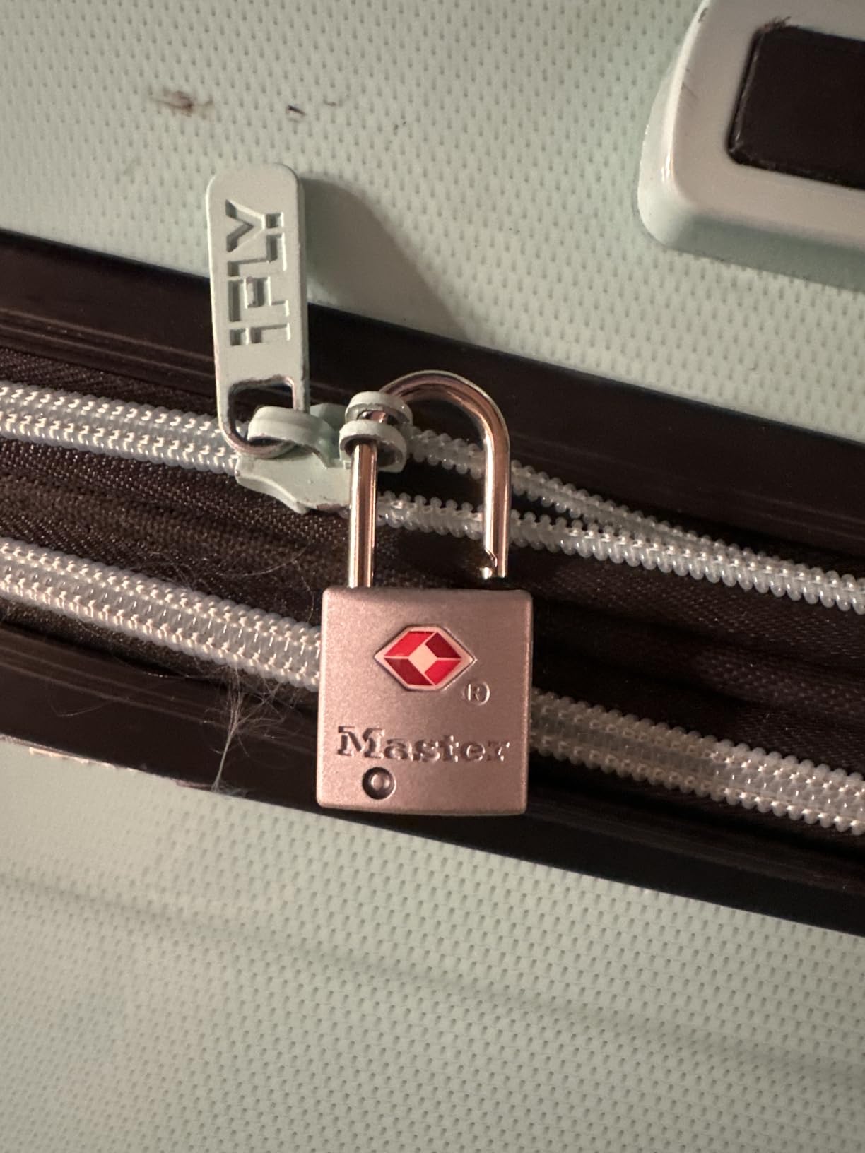 Master Lock TSA Luggage Lock Keyed Alike, Brass and Nickel, 4-Pack 4683Q customer photo 2