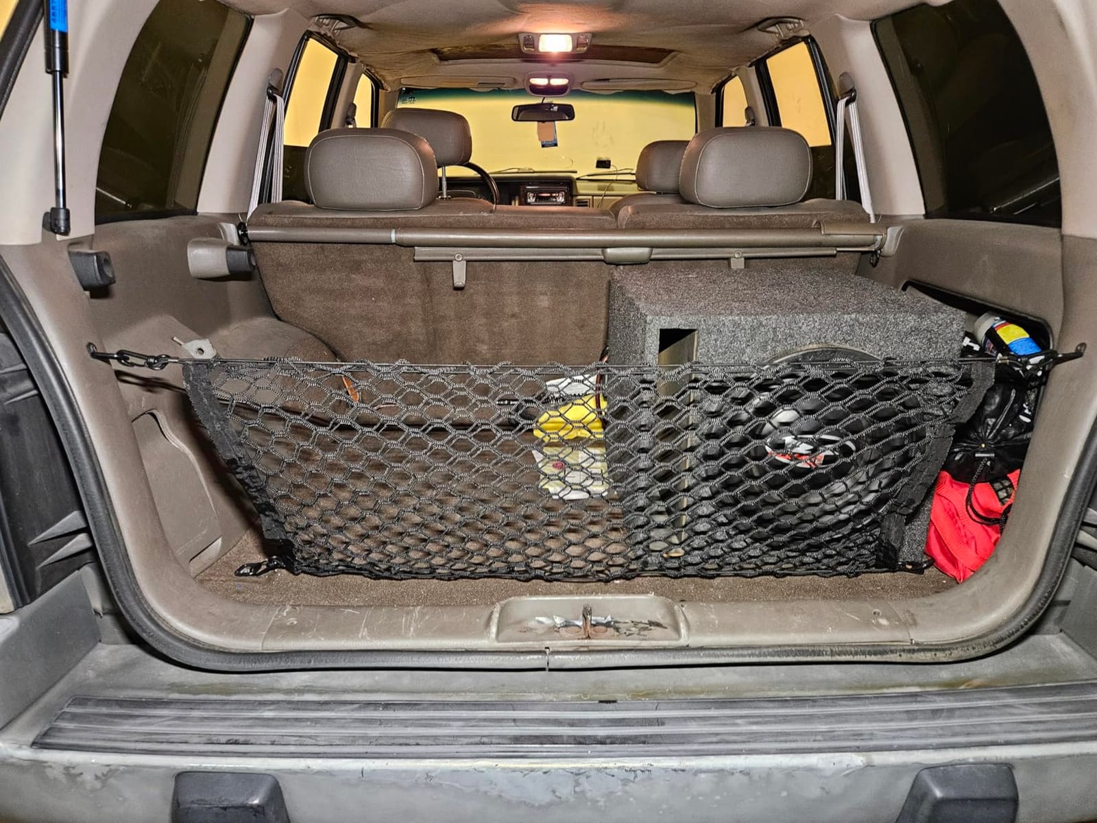 Amiss Cargo Net Stretchable, Car Exterior Accessories, Adjustable Elastic Trunk Storage Net with Hook for SUVs, Cars and Trucks (35.4x15.8 Inch) customer photo 1