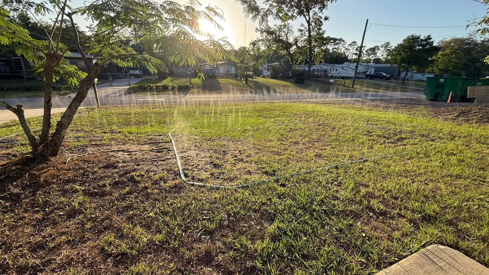 Watoo 2026 Sprinkler Hose & Soaker Hose for Yard - 50 FT Reinforced Flat Garden Hose with Holes, Heavy Duty No-Kink Lawn Irrigation Hose (Includes Stakes, High Pressure Spray) customer photo 2