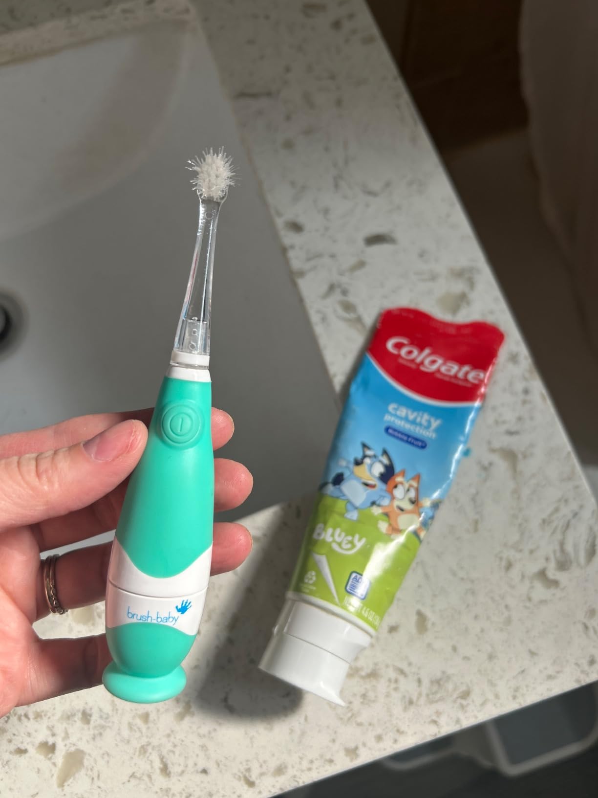 brush-baby BabySonic Infant and Toddler Electric Toothbrush for Ages 0-3 Years - Smart LED Timer and Gentle Vibration Provide a Fun Brushing Experience - Includes 2 Sensitive Brush Heads (Teal) customer photo 1