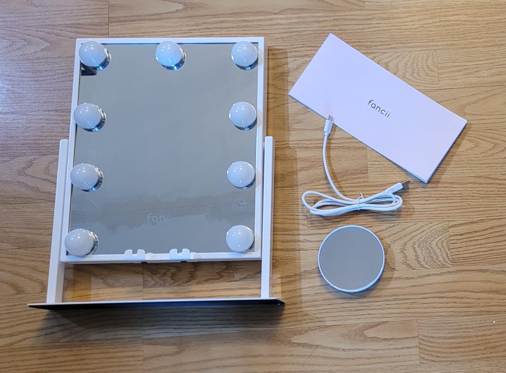 Fancii Vanity Mirror with Lights, BT Speaker, Wireless Charging - Detachable 10X Magnifying Mirror, 9 Hollywood Bulbs, LED Lighted Makeup Mirror with Phone Stand, 3 Color Modes, Adjustable Tilt customer photo 1