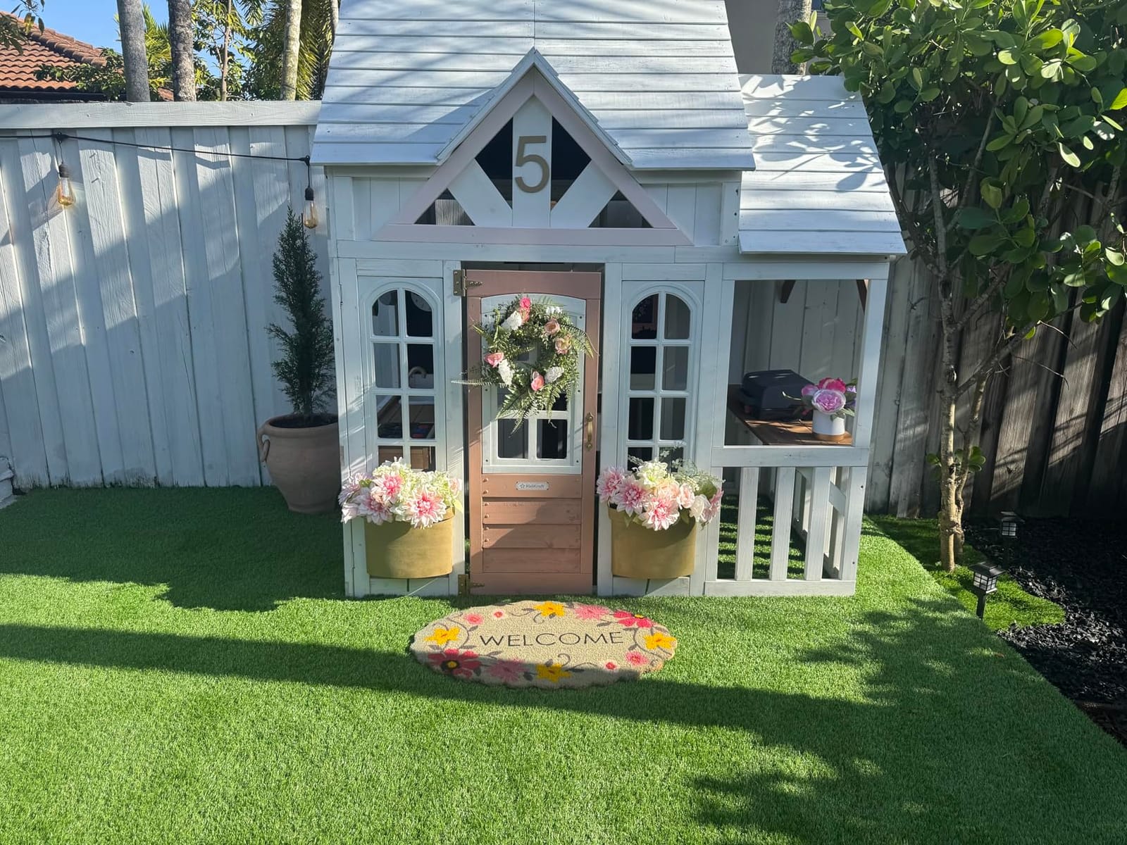 KidKraft Lantana Lane Wooden 6-ft. Tall Playhouse with Secret Door customer photo 1