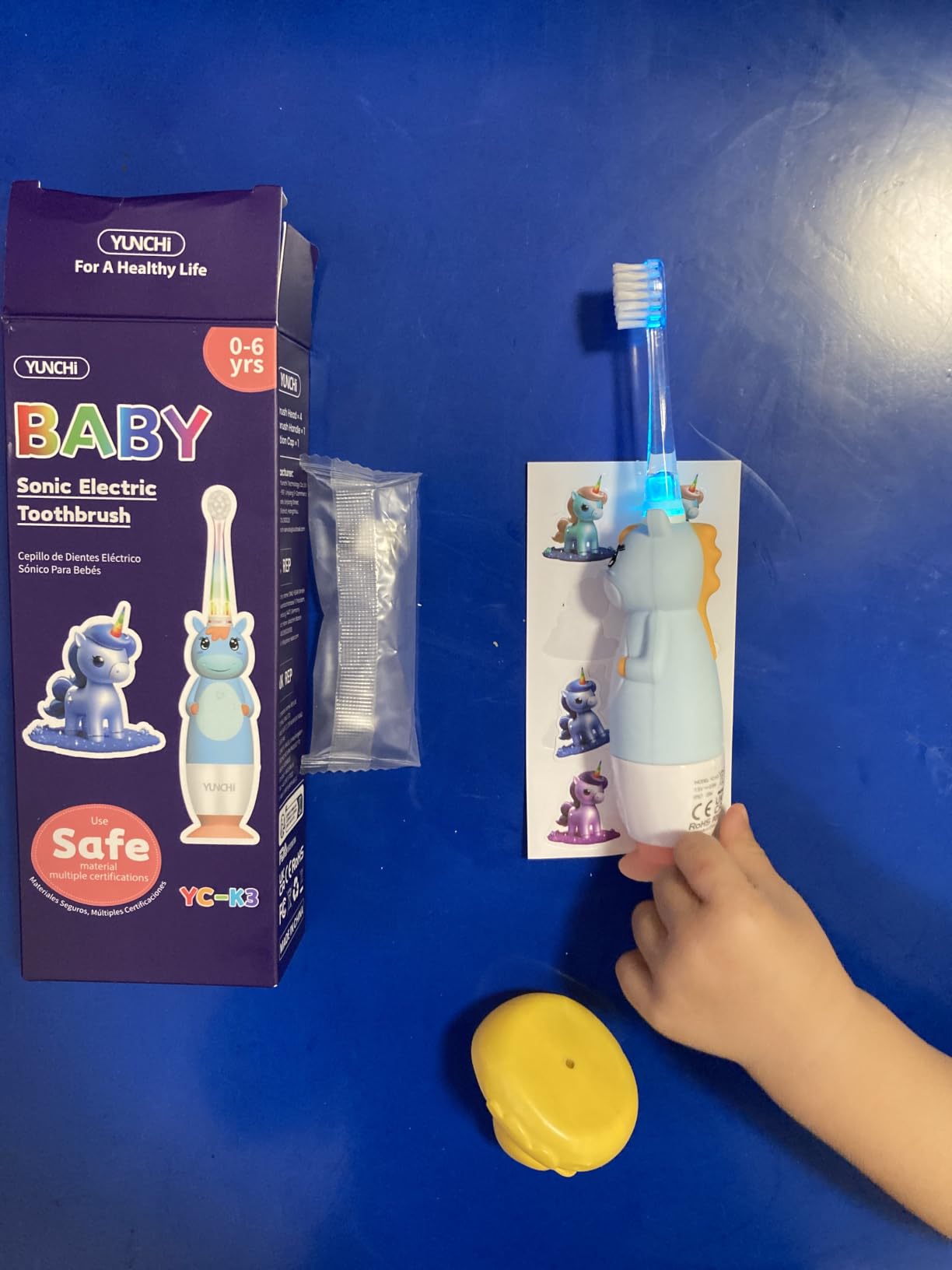 YUNCHI Toddler Electric Toothbrush Kids 0-3-6 Years, Baby Electric Toothbrush with Colorful LED Light, Battery Powered Toddler Toothbrush with 2 Minutes Timer 4 Brush Heads, Infant Toothbrush (Pink) customer photo 2